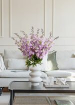 Polyester floras purple delphiniums in white vase